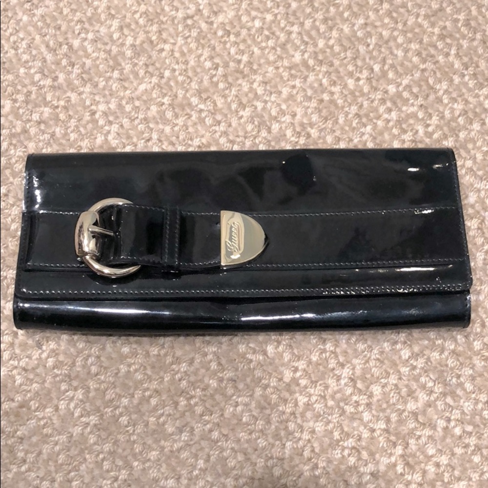 Gucci patent leather clutch w/signature buckle.